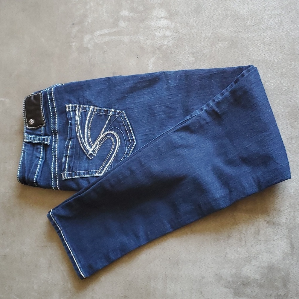 Silver Suki Mid Skinny Jeans.